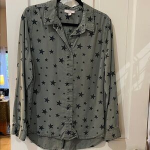 Como Vintage Black Star Pattern Shirt on olive green background